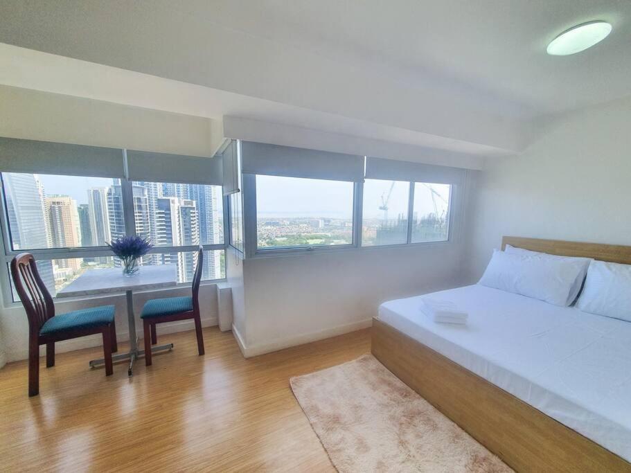 Bgc Taguig Cozy 2 Bedroom Loft, With Stunning Bgc Skyline View! 마닐라 외부 사진